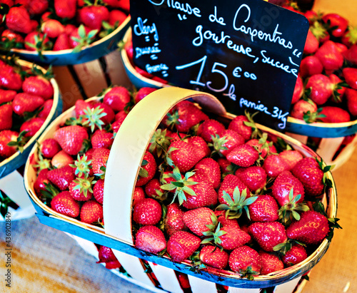 Colorful ripe red strawberries for sale at the market in Provence, France.  photo