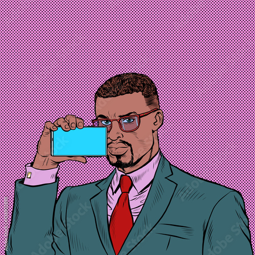 african businessman shoots video on smartphone