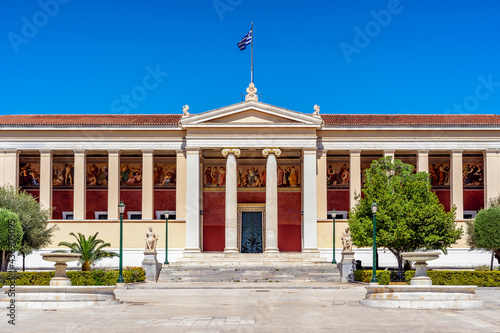 Fototapeta Naklejka Na Ścianę i Meble -  Athens, Attica, Greece. The National and Kapodistrian University of Athens neoclassical building. Facade view on a sunny day with clear blue sky