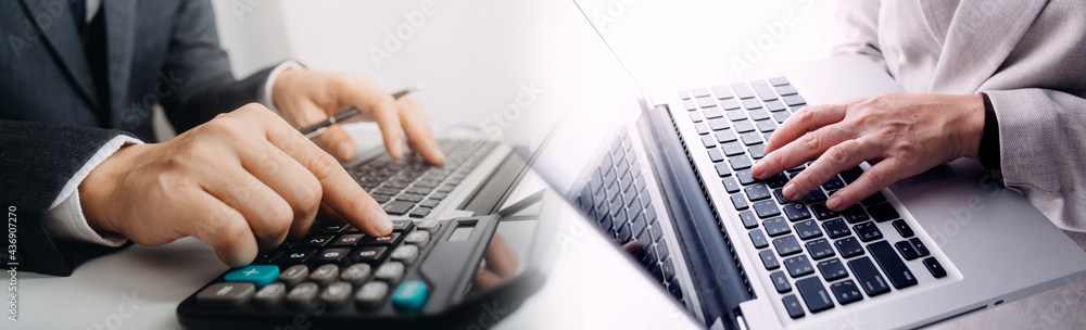 Fototapeta premium Businesswoman use laptop ,analytics and financial and bank technology concept, chart from computer laptop,Business growth concept