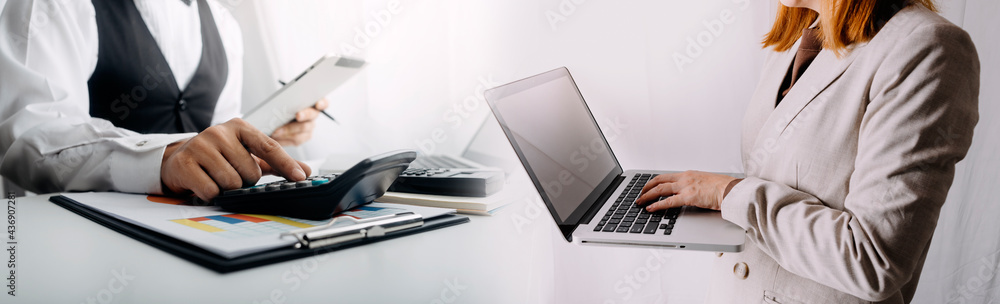 Businesswoman use laptop ,analytics and financial and bank technology concept, chart from computer laptop,Business growth concept Businesswoman use laptop ,analytics and financial and bank technology concept, chart from computer laptop,Business growth concept