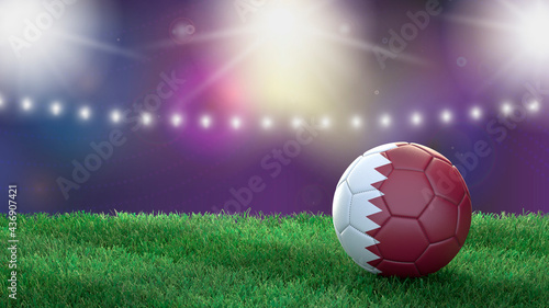 Soccer ball in flag colors on a bright blurred stadium background. Qatar. 3D image © Sasha Strekoza
