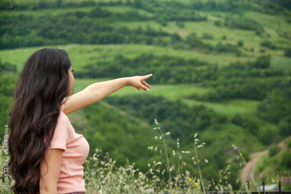 woman finger show in nature woman finger show in nature