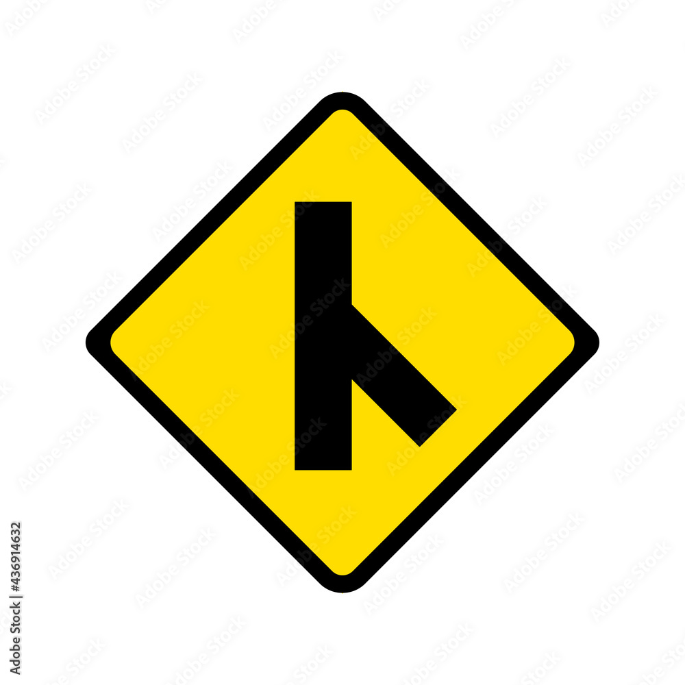 Warning of skewed side road junction on left traffic sign. Yellow background. Warning of skewed side road junction on left traffic sign. Yellow background.