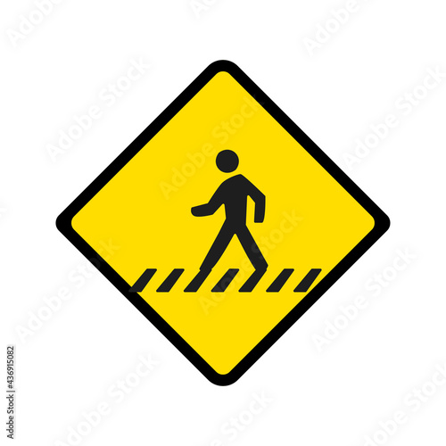 Warning sign to watch out for people crossing the road.