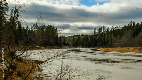 calm forest smal lriver with small waterfall from natural rocks photo