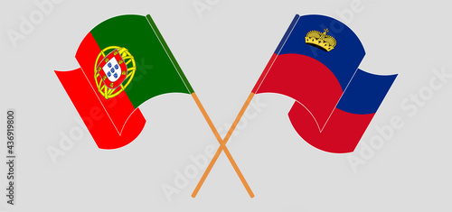 Crossed and waving flags of Portugal and Liechtenstein