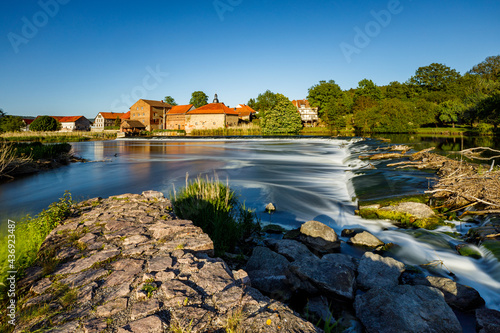 The village of Sallmannshausen at the Werra River in Thuringia photo