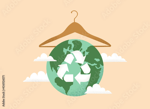 Vector illustration of Slow fashion concept with Earth planet globe, clothes hanger and Reuse, Reduce, Recycle symbol photo