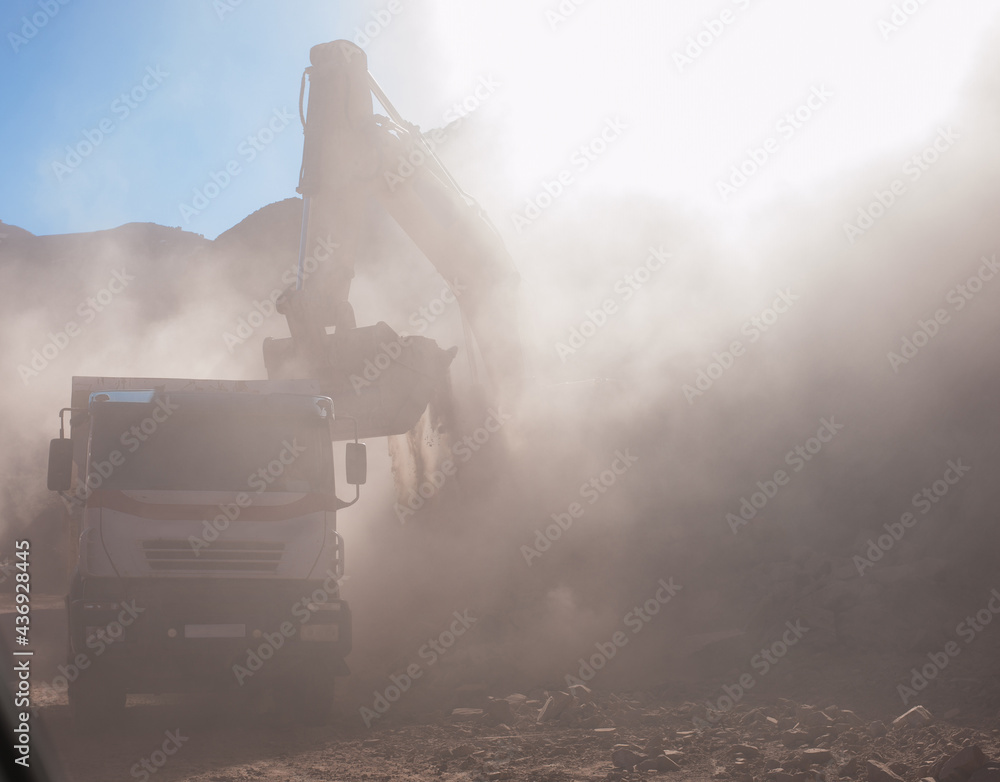 Fototapeta premium heavy mining construction works with heavy machinery