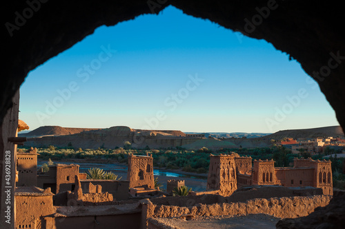 magnificent old kasbah Ait Benhaddou in Atlas mountains landscape in the sunset light