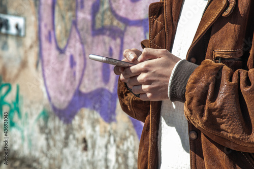 close-up of hands with mobile phone