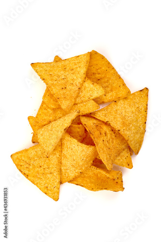 Delicious nachos chips, corn chips, isolated on white background. High resolution image.