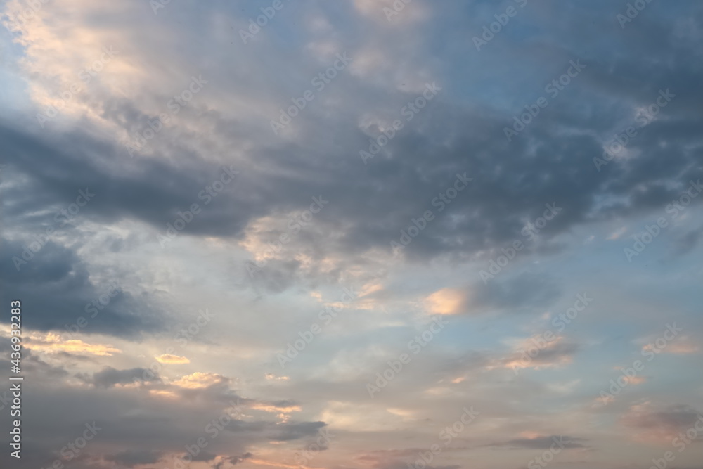 clouds float at sunset