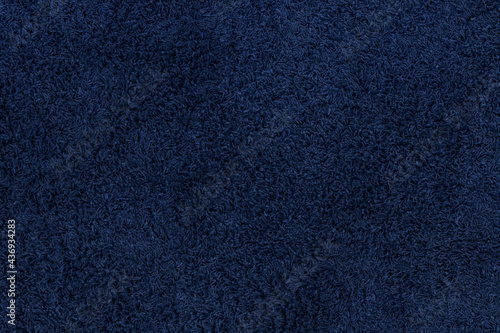 detailed texture of dark blue floor carpet