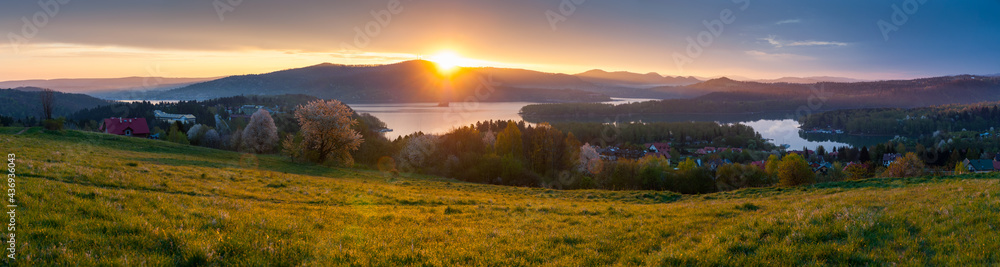 The April sunrise over Lake Solina seen from the viewpoint in Polańczyk. Polańczyk, Bieszczady