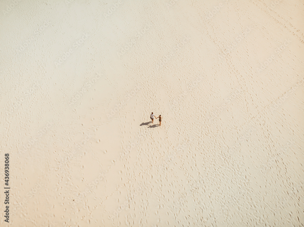Aerial view of two people walking on Carlo Sandblow, Queensland, Australia. Aerial view of two people walking on Carlo Sandblow, Queensland, Australia.