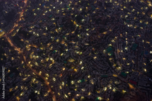 Aerial view of a huge refugee camp at night with makeshift houses near Myanmar border, Kutupalong Rohingya camp near Ukhia town, Bangladesh. photo