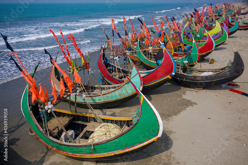 Aerial view of traditional fishing boats along the shoreline on the beach on St. Martin's Island, Teknaf, Chittagong, Bangladesh. photo