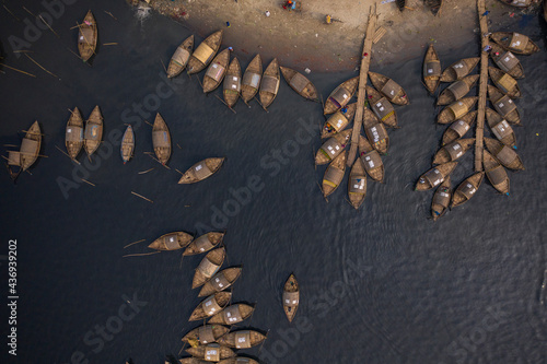 Aerial view of traditional fishing boat docked along Shitalakshya river in Bandar township, Dhaka state, Bangladesh. photo