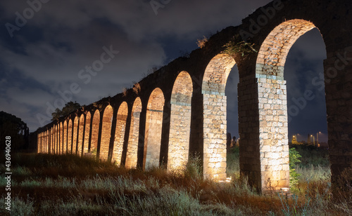 Night view of the remains of the 200 year old Ottoman aqueduct, supplied water from Cabri springs to Acco, western Galilee, Israel. photo