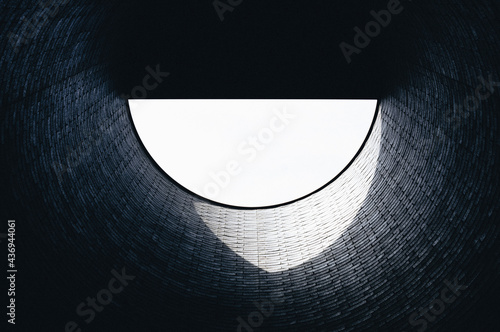 Light shining through a window on bricks