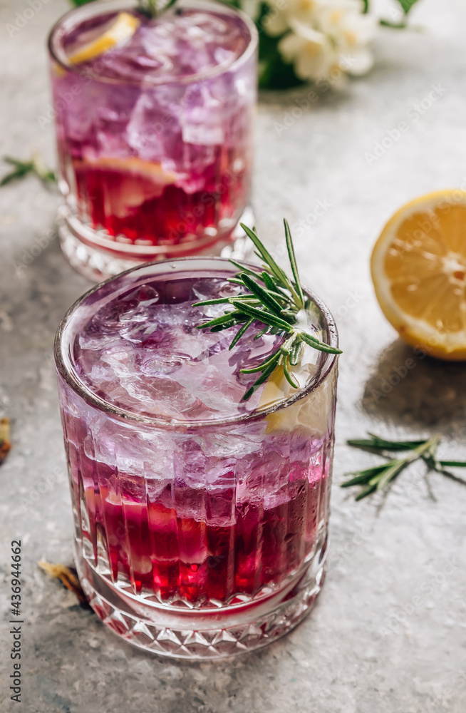 Butterfly pea flower tea with lemon. Purple iced lemonade. Healthy detox herbal drink Butterfly pea flower tea with lemon. Purple iced lemonade. Healthy detox herbal drink