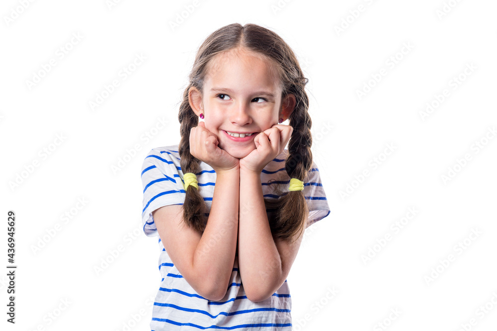 Cute european smiling little girl with pigtails isolated on white background.