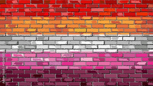 Lesbian pride flag on a brick wall - Illustration,  
Five-stripes variant of flag photo