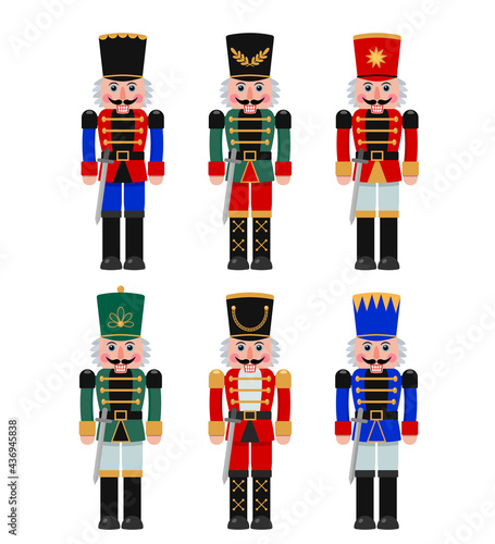 A set of Christmas Nutcrackers in a red, blue, green suit with a sword.