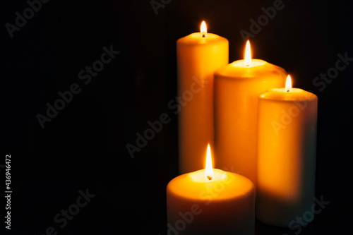 Four burning candles