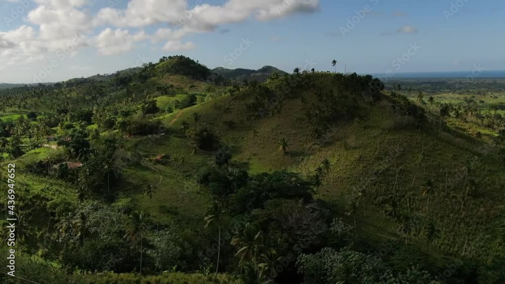 Vacation in Dominican Republic, view of a massive grass covered mountain Vacation in Dominican Republic, view of a massive grass covered mountain