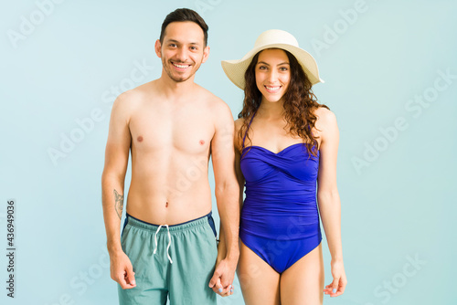 Attractive boyfriend and girlfriend by the pool