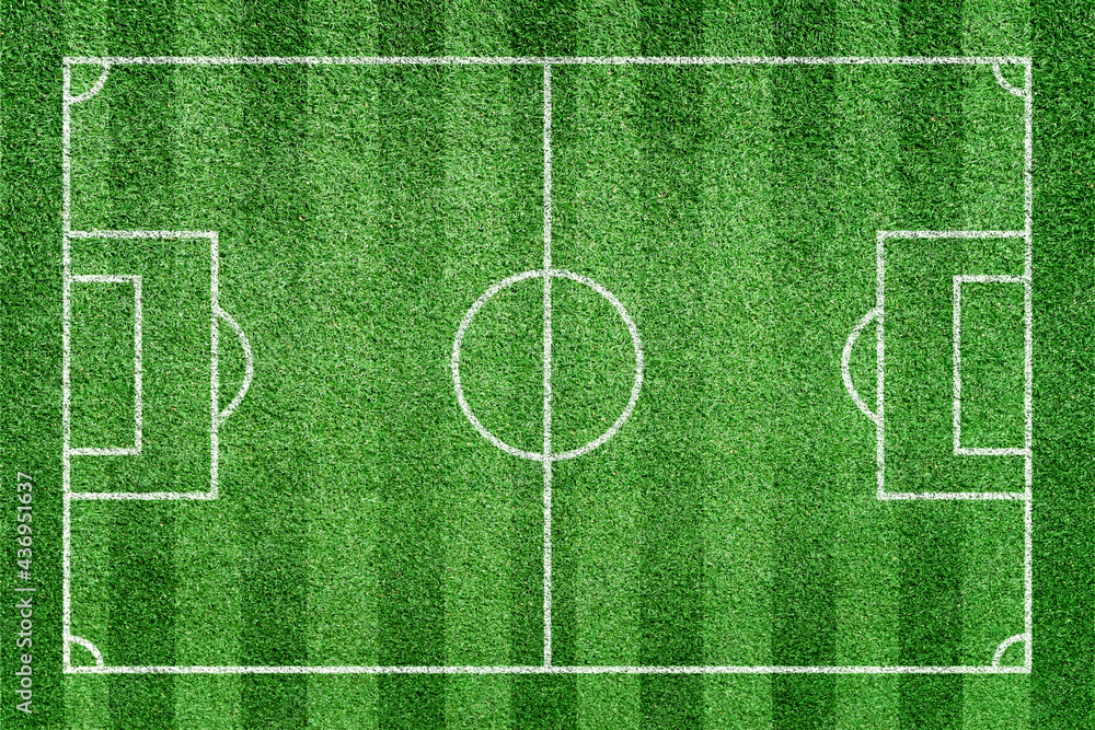 Soccer field. Stripe grass football stadium. Green lawn with white lines pattern. Top view Soccer field. Stripe grass football stadium. Green lawn with white lines pattern. Top view