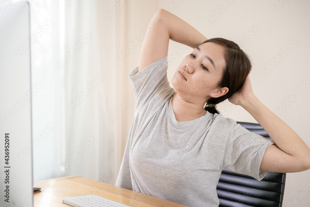 Young Asian woman having an office syndrome health problem. Young Asian woman having an office syndrome health problem.