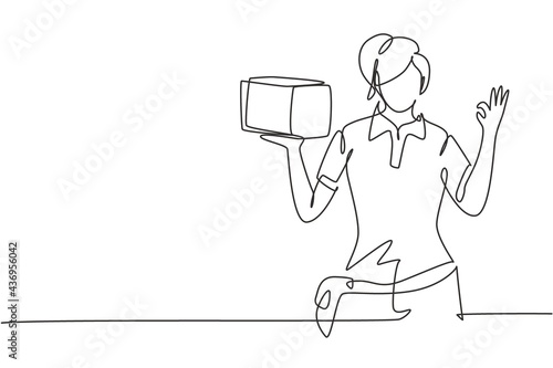 Continuous one line drawing deliverywoman with gesture okay, carrying the package box to be delivered to customers with best service. Success job. Single line draw design vector graphic illustration