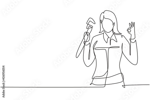 Single one line drawing female plumber with gesture okay ready to work on repairing leaking drain in sink and house's drains. Success business. Continuous line draw design graphic vector illustration