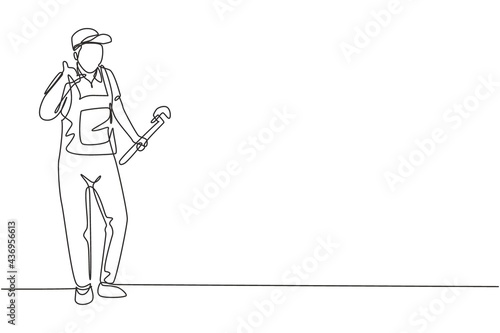 Single one line drawing plumber stands with call me gesture and holding carpentry tool fixing broken plumbing at home. Success business. Modern continuous line draw design graphic vector illustration