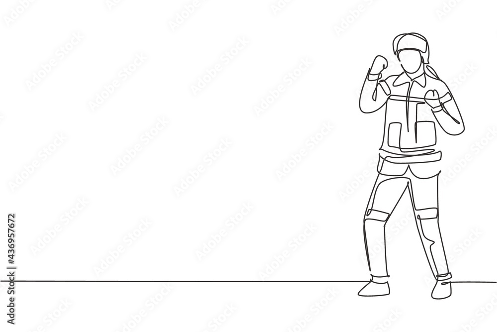 Single one line drawing firefighter stood with celebrate gesture, wearing helmet and full uniform work to extinguish fire at building. Modern continuous line draw design graphic vector illustration