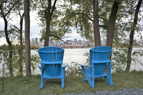 blue chairs in a park