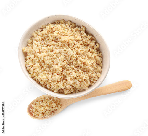 Bowl and spoon with tasty quinoa on white background