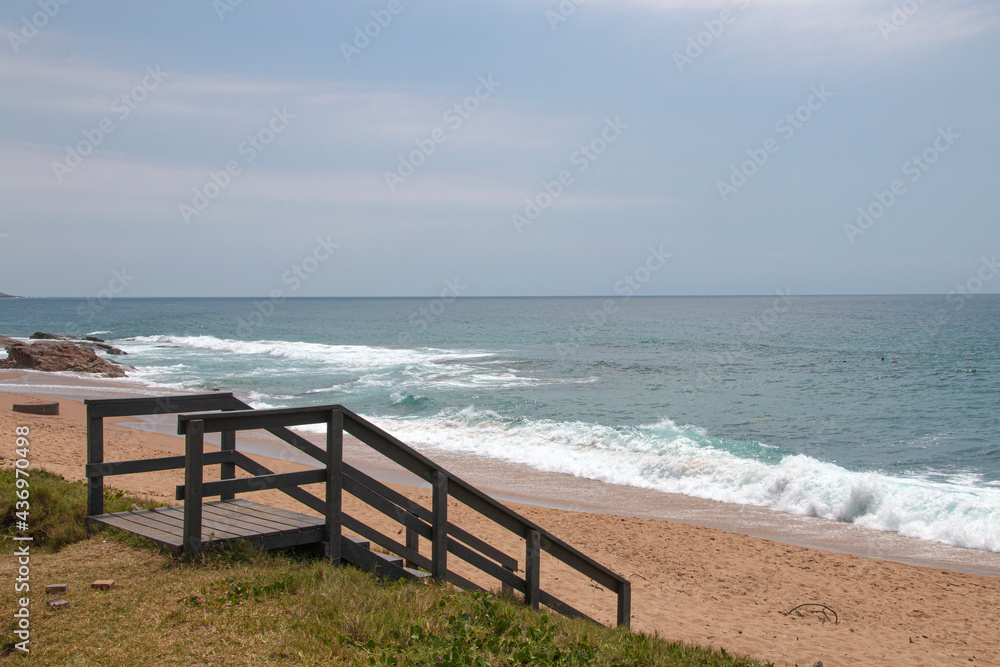 Entrance onto Beach by Steep Wooden Stairs