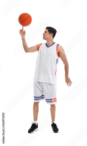 Basketball player spinning ball on finger against white background