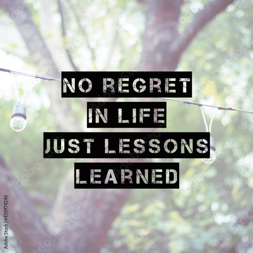 Inspirational motivating quote on blur background, "No regret in life. Just lessons learned"