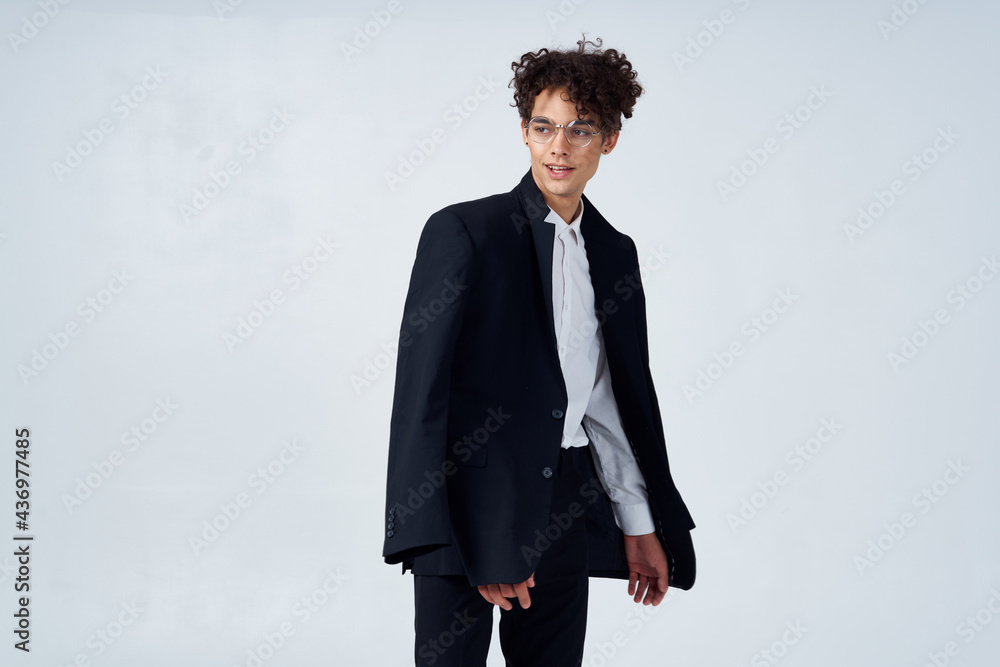 man in black blazer curly hair fashion modern style business suit man in black blazer curly hair fashion modern style business suit