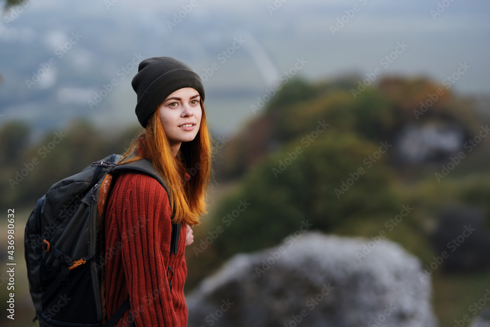 woman hiker backpack travel landscape mountains adventure