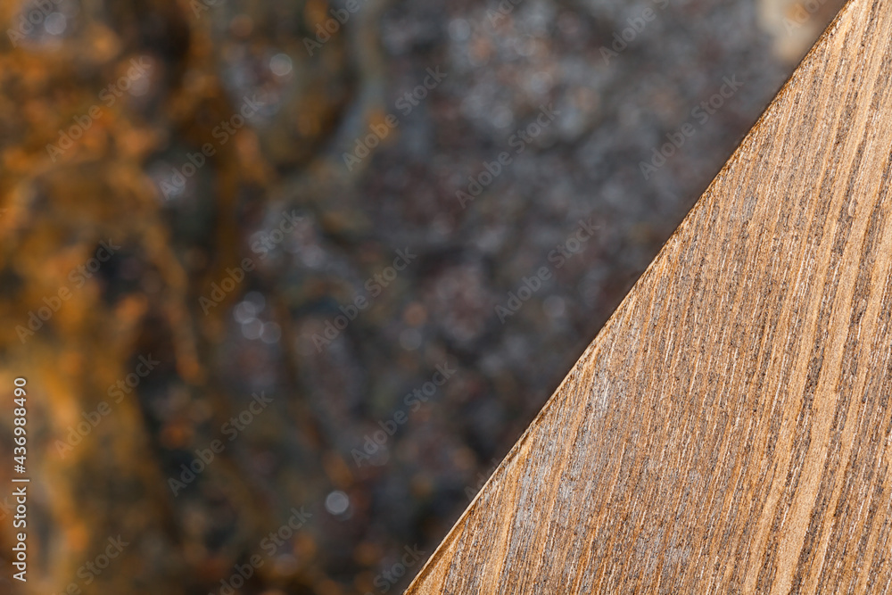 Fototapeta premium Fragment of wood on blurred background, abstract.