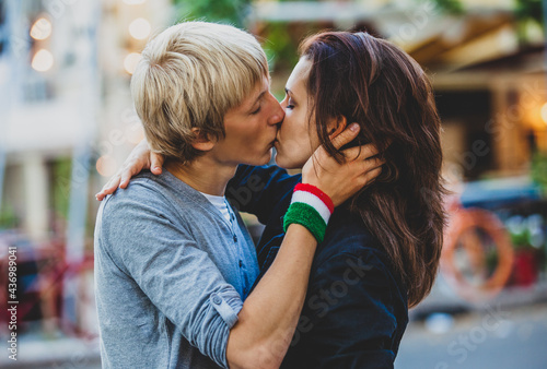 Young couple kissing on the street