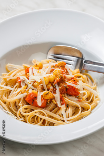 pasta tagliatelle with tomato sauce and chickpeas