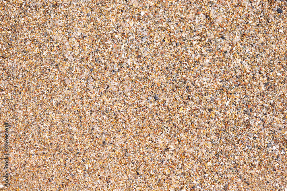 Texture of stones and sand on beach area Texture of stones and sand on beach area